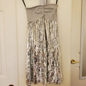 Bebe, sequin strapless baby doll style dress.